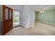 Inviting foyer with a view into the dining room, creating a warm and welcoming entrance at 195 Creekside Way, Mcdonough, GA 30252