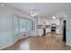 Eat-in kitchen features a bay window, stainless steel appliances, and white cabinets at 195 Creekside Way, Mcdonough, GA 30252