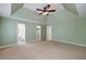 Open Primary bedroom with ensuite bath, and closets, and tray ceiling at 195 Creekside Way, Mcdonough, GA 30252