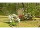 Shed exterior with flowers and trees at 195 Creekside Way, Mcdonough, GA 30252