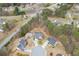 Real estate showcasing a well-planned community, beautiful homes, and lush trees from an aerial view at 802 Towering Pine Trl, Lawrenceville, GA 30045