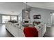 Bright living room featuring a fireplace, vaulted ceilings, and stylish decor at 802 Towering Pine Trl, Lawrenceville, GA 30045