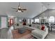 Spacious living area with an open layout connecting the living room, dining area, and kitchen at 802 Towering Pine Trl, Lawrenceville, GA 30045