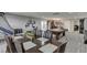Open recreation room with a dining table, kitchenette, and a pool table at 802 Towering Pine Trl, Lawrenceville, GA 30045