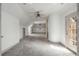 Bonus room featuring ample space, carpet, dormer windows, and an outdoor balcony at 1483 Jones Rd, Roswell, GA 30075