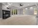 Large main bedroom features a fireplace, large windows, and access to a private balcony at 1483 Jones Rd, Roswell, GA 30075