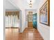 Charming entryway with hardwood floors, sidelights, and elegant details at 9095 Cedar Grove Rd, Fairburn, GA 30213