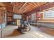 Spacious garage featuring storage shelving and natural light at 9095 Cedar Grove Rd, Fairburn, GA 30213
