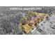 Aerial view showcasing the estimated property lines, displaying the expanse of land with surrounding trees and greenery at 9095 Cedar Grove Rd, Fairburn, GA 30213