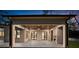 Back porch with a wood ceiling, fireplace, and exterior door access to the home's yard at 942 Fairfield Dr, Marietta, GA 30068