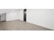 Bright, vacant bedroom with light hardwood floors at 942 Fairfield Dr, Marietta, GA 30068