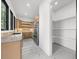 The kitchen has stainless steel appliances, light wood cabinets, a walk in pantry, and marble countertops at 942 Fairfield Dr, Marietta, GA 30068