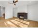 Cozy living room with ceiling fan and fireplace at 942 Fairfield Dr, Marietta, GA 30068