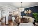 Dining area with a view into the living room, and breakfast bar with wood cabinets at 1145 Verandah Se Ln, Atlanta, GA 30316