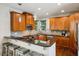 Well-appointed kitchen featuring granite countertops, ample cabinet space, and modern stainless steel appliances at 1145 Verandah Se Ln, Atlanta, GA 30316