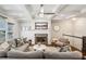 Bright living room with coffered ceilings, fireplace with stone surround, and a comfortable seating arrangement at 1145 Verandah Se Ln, Atlanta, GA 30316