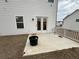 Back patio provides a spot for outdoor seating and enjoyment at 14 Ledgemont Way, Acworth, GA 30101