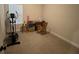 Versatile bedroom that can be used as a home office or fitness space featuring a fitness machine, and a desk at 14 Ledgemont Way, Acworth, GA 30101