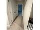 Hallway with carpet flooring and a large closet, providing storage space at 14 Ledgemont Way, Acworth, GA 30101