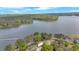 Breathtaking aerial view of a lake house nestled among trees by the water at 24 Allatoona Landing Rd #29, Cartersville, GA 30121