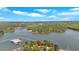 Panoramic aerial view of a lakeside property with boat docks and lush greenery at 24 Allatoona Landing Rd #29, Cartersville, GA 30121
