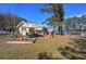 Enjoy outdoor living with a barbecue and seating area while admiring the lake at 24 Allatoona Landing Rd #29, Cartersville, GA 30121