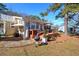 Charming backyard featuring a cozy patio with outdoor furniture and lush greenery at 24 Allatoona Landing Rd #29, Cartersville, GA 30121