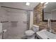Modern bathroom with tiled walls, walk-in shower, stone accents, and modern fixtures at 24 Allatoona Landing Rd #29, Cartersville, GA 30121
