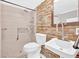 Modern bathroom with stone accent wall, walk-in shower, and contemporary fixtures at 24 Allatoona Landing Rd #29, Cartersville, GA 30121
