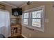 Comfortable bedroom featuring built-in shelves, natural light, and views of the lake at 24 Allatoona Landing Rd #29, Cartersville, GA 30121