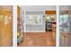 Inviting entryway with hardwood floors transitions to living area and adjacent room, showcasing open layout at 24 Allatoona Landing Rd #29, Cartersville, GA 30121