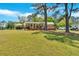 Exterior view of home with a spacious lawn and outdoor entertaining area at 24 Allatoona Landing Rd #29, Cartersville, GA 30121