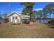 Inviting home features a cozy outdoor dining area, swing set, and nearby lake access at 24 Allatoona Landing Rd #29, Cartersville, GA 30121