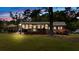 Charming home with well-manicured lawn, mature trees, and inviting front porch for relaxation at 24 Allatoona Landing Rd #29, Cartersville, GA 30121