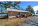 Charming home features a metal roof, easy access ramp, and a view of the lake at 24 Allatoona Landing Rd #29, Cartersville, GA 30121