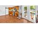Functional kitchen featuring wood cabinets, updated appliances, and a cozy breakfast table area at 24 Allatoona Landing Rd #29, Cartersville, GA 30121