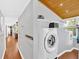 Bright laundry room with modern washer/dryer, wooden ceiling and ample storage space at 24 Allatoona Landing Rd #29, Cartersville, GA 30121