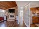 Comfortable living room with a stone fireplace and wooden ceiling, creating a warm ambiance at 24 Allatoona Landing Rd #29, Cartersville, GA 30121