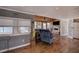 Cozy living room featuring hardwood floors, recessed lighting, fireplace, and large windows with water views at 24 Allatoona Landing Rd #29, Cartersville, GA 30121
