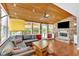 Inviting living room features wood ceiling, brick fireplace, ample natural light and comfortable seating at 24 Allatoona Landing Rd #29, Cartersville, GA 30121