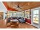 Bright living room with wood ceiling, lake views, comfortable seating, and access to the outdoors at 24 Allatoona Landing Rd #29, Cartersville, GA 30121