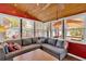 Cozy living room featuring a wooden ceiling, large windows, and comfortable sectional sofa at 24 Allatoona Landing Rd #29, Cartersville, GA 30121