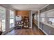 Cozy living space with wood accents, appliances, and ample natural light from the windows and door at 24 Allatoona Landing Rd #29, Cartersville, GA 30121
