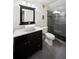 Modern bathroom featuring marble counters, vessel sink, and glass enclosed shower at 3473 Regalwoods Dr, Atlanta, GA 30340