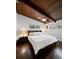 Bright bedroom with wooden ceilings, hardwood floors, and multiple windows allowing for great natural lighting at 3473 Regalwoods Dr, Atlanta, GA 30340