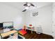 Bright bedroom with hardwood floors and a ceiling fan, perfect for a playroom at 3473 Regalwoods Dr, Atlanta, GA 30340