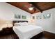 Cozy bedroom featuring natural lighting and a ceiling fan at 3473 Regalwoods Dr, Atlanta, GA 30340