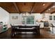 Open dining area featuring hardwood floors, modern decor, and seamless access to the kitchen at 3473 Regalwoods Dr, Atlanta, GA 30340