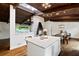 Open layout kitchen with an island and seamless connection to the dining room at 3473 Regalwoods Dr, Atlanta, GA 30340