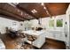 Open kitchen with island, stainless appliances, and connection to the dining area at 3473 Regalwoods Dr, Atlanta, GA 30340